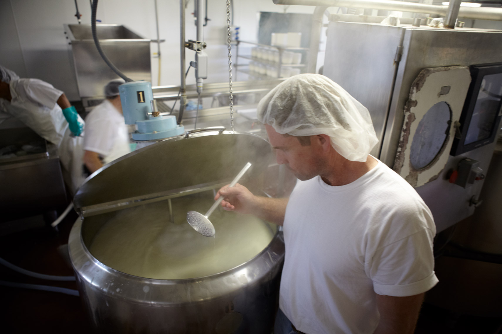 AlanCampbellPhotography, stiring the milk during cheesemaking